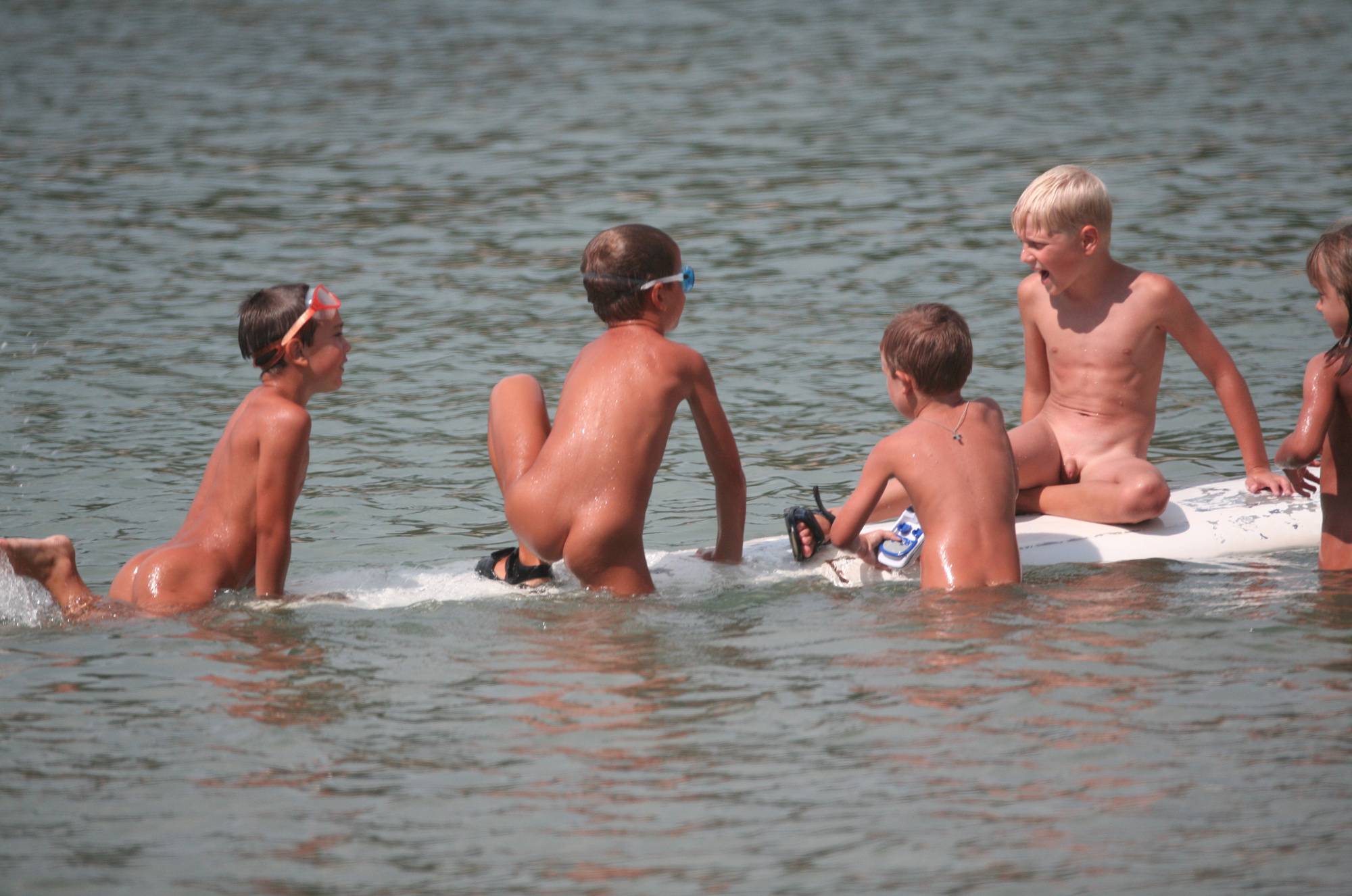 Several Kids On Surfboard - 1